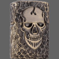 Briquet à essence tête de mort en relief - bronze - Briquet