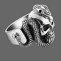 Bague crane et serpent en argent