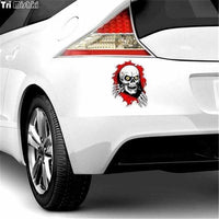 Sticker Tete de mort sortant d’un trou 13x17cm - Sticker