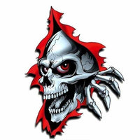 Stickers tete de mort souriante sortant d’un trou 13*17cm - 